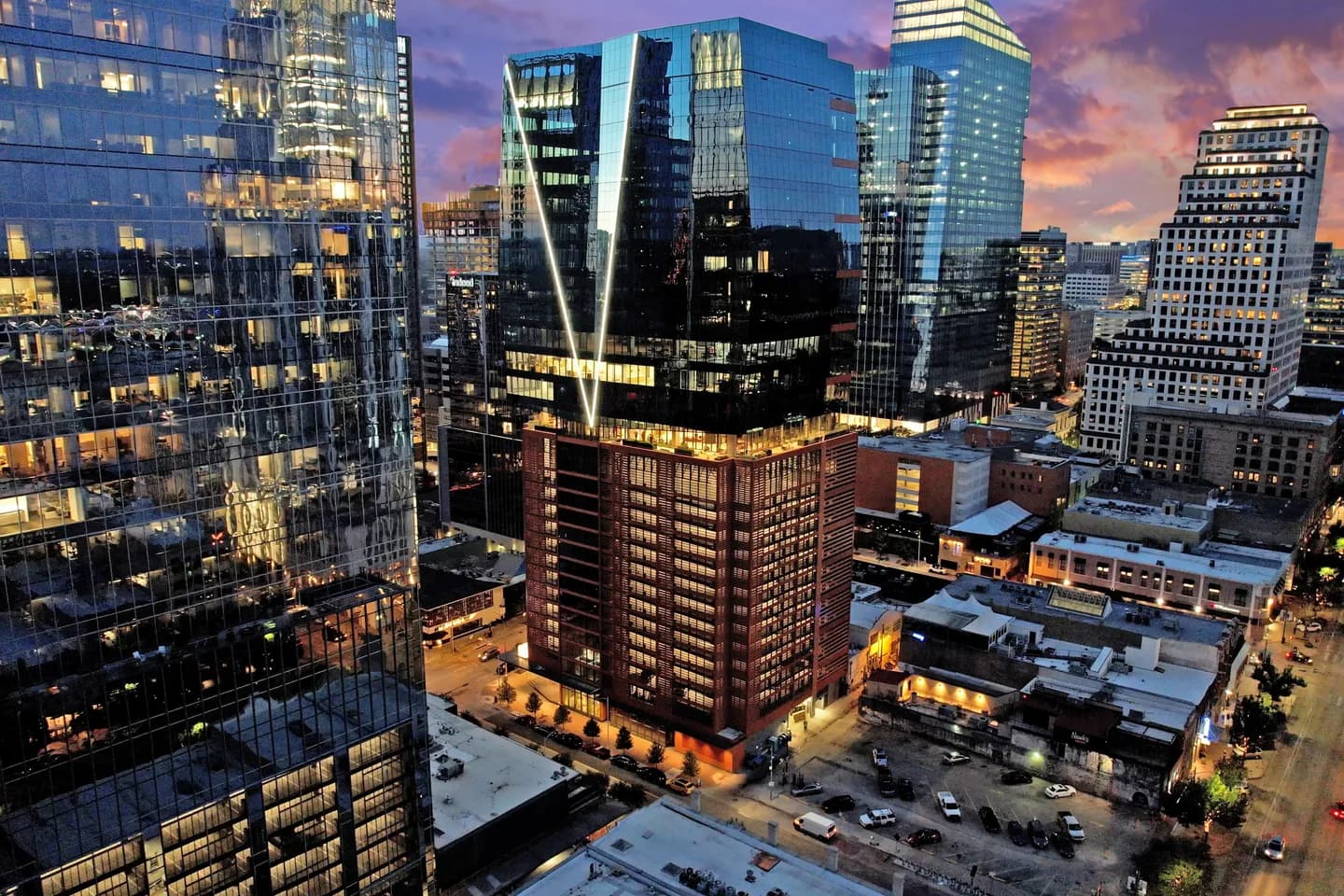 Aerial dusk photo of the 405 Colorado office tower in downtown Austin Aerial dusk photo of the 405 Colorado office tower in downtown Austin